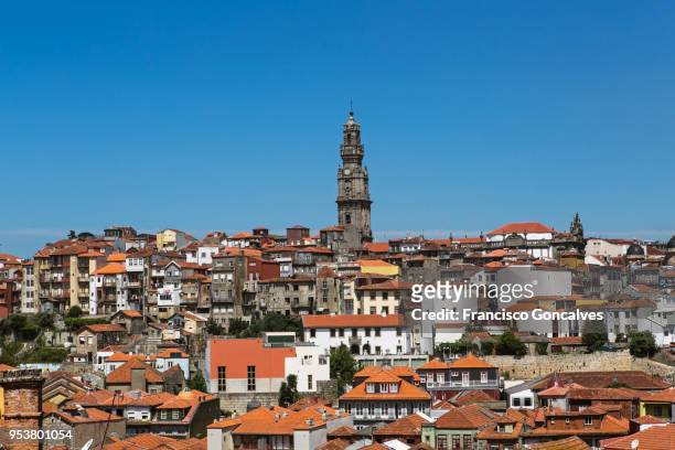 beautiful view of porto and clérigos church bell tower - bell tower tower stock-fotos und bilder