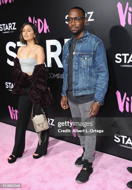 Actress Erin Lim and actor Lamorne Morris arrive for Starz "Vida" Premiere held at Regal LA Live Stadium 14 on May 1, 2018 in Los Angeles, California.