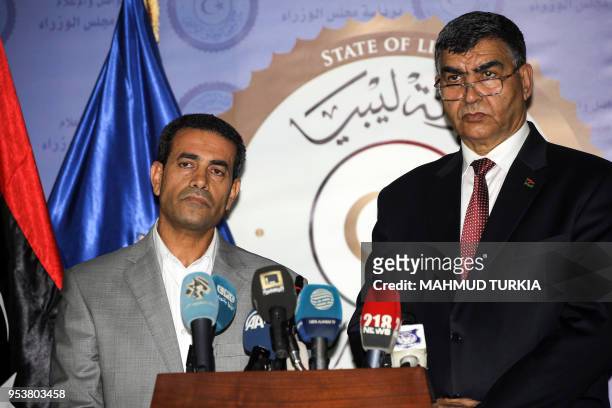 Emad al-Sayh , Chairman of the Libyan Electoral Commission, and Brigadier-General Abdel Salam Ashour, the Government of National Accord 's Interior...