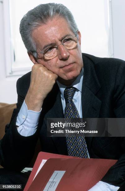 Competition Commissioner Mario Monti answers questions in his office in the EU Commission on Mat 17,2002 in Brussels,Belgium.