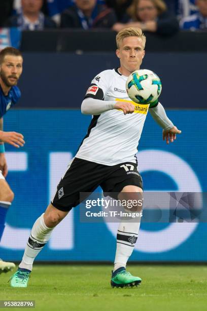 Oscar Wendt of Moenchengladbach controls the ball during the Bundesliga match between FC Schalke 04 and Borussia Moenchengladbach at Veltins-Arena on...