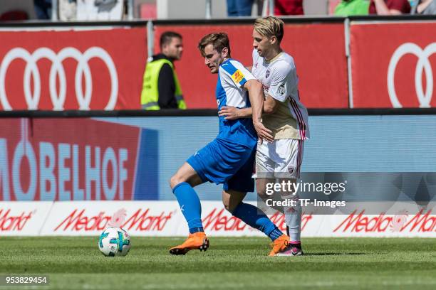 Johannes van den Bergh of Kiel and Thomas Pledl of Ingolstadt battle for the ball during the Second Bundesliga match between FC Ingolstadt 04 and...