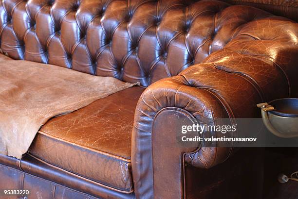retro leather sofa - old leather couch stock pictures, royalty-free photos & images
