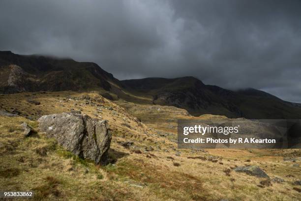 changing light in the mountains of snowdonia, wales - capel curig stock pictures, royalty-free photos & images