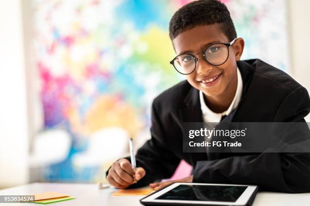 business cute boy writing ideas - student inventor stock pictures, royalty-free photos & images