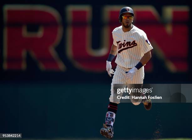 Eddie Rosario of the Minnesota Twins rounds the bases after hitting a solo home run against the Toronto Blue Jays during the second inning of the...