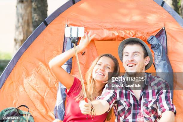 couple making selfie photo - taseffski stock pictures, royalty-free photos & images
