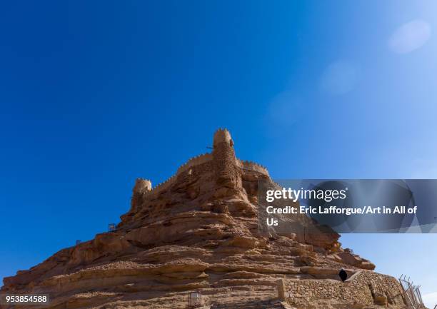The qasr zaba"u2019al stands on a tall rock spur overlooking the ancient village, Al-Jawf Province, Sakaka, Saudi Arabia on January 19, 2010 in...