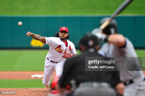 Carlos Martinez of the St. Louis Cardinals pitches to Nicky Delmonico of the Chicago White Sox during the fourth inning at Busch Stadium on May 2,...