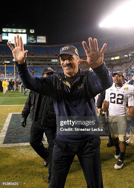 Head coach Dave Wannstedt of the Pittsburgh Panthers waves to the fans after a 19-17 victory over the North Carolina Tar Heels on December 26, 2009...