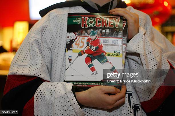 Cole Hartje from Bemidji, Minnesota selling programs before the game at the Xcel Energy Center on December 26, 2009 in Saint Paul, Minnesota.