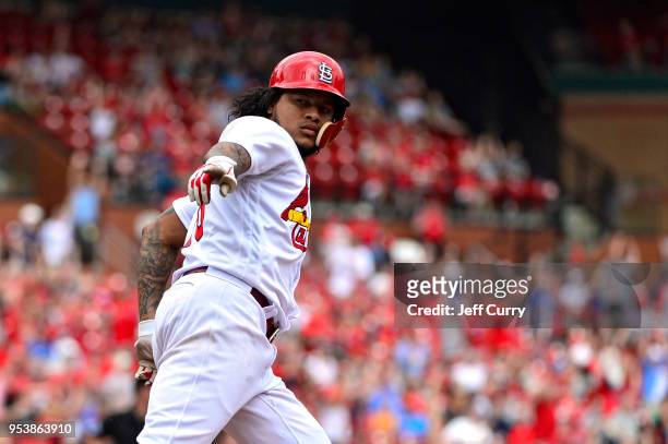 Carlos Martinez of the St. Louis Cardinals celebrates after hitting a solo home run during the sixth inning against the Chicago White Sox at Busch...