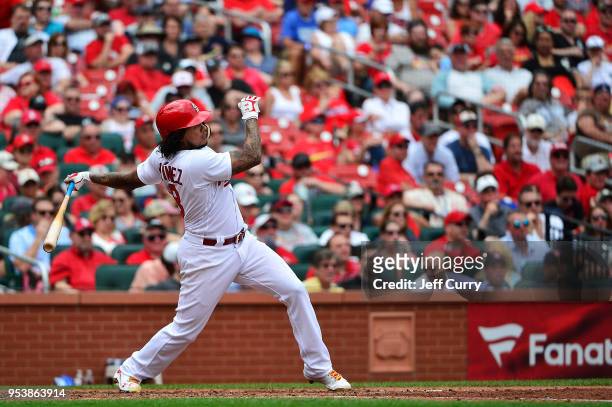 Carlos Martinez of the St. Louis Cardinals hits a solo home run during the sixth inning against the Chicago White Sox at Busch Stadium on May 2, 2018...