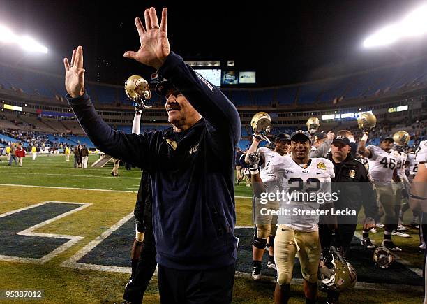 Head coach Dave Wannstedt of the Pittsburgh Panthers waves to the fans after a 19-17 victory over the North Carolina Tar Heels on December 26, 2009...