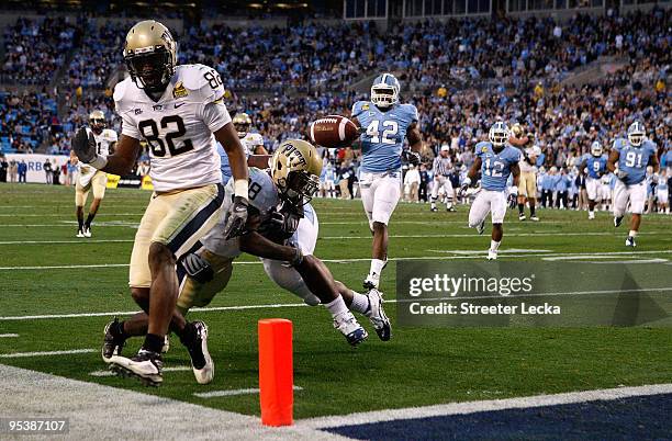 Jonathan Baldwin of the Pittsburgh Panthers watches as teammate Dion Lewis fumbles the ball at the goal line against the North Carolina Tar Heels...