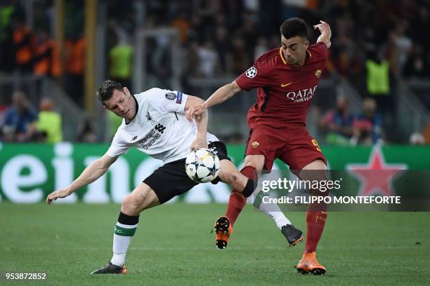 Liverpool's English midfielder James Milner challenges Roma's Italian striker Stephan El Shaarawy during the UEFA Champions League semi-final second...