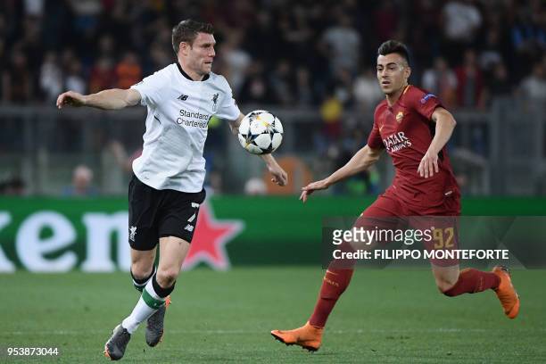 Liverpool's English midfielder James Milner challenges Roma's Italian striker Stephan El Shaarawy during the UEFA Champions League semi-final second...