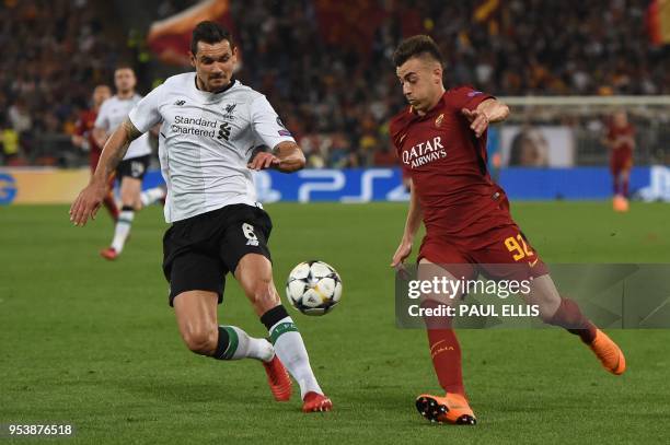 Liverpool's Croatian defender Dejan Lovren vies with Roma's Italian striker Stephan El Shaarawy, during the UEFA Champions League semi-final second...