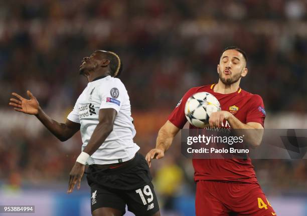 Sadio Mane of Liverpool competes for the ball with Kostas Manolas of AS Roma during the UEFA Champions League Semi Final Second Leg match between...