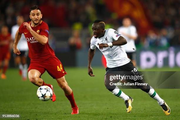 Sadio Mane of Liverpool runs at Kostas Manolas of AS Roma during the UEFA Champions League Semi Final Second Leg match between A.S. Roma and...