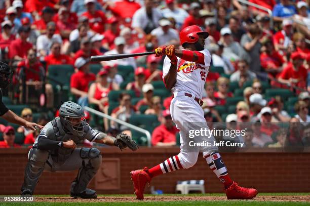 Dexter Fowler of the St. Louis Cardinals hits a two run home run during the seventh inning against the Chicago White Sox at Busch Stadium on May 2,...