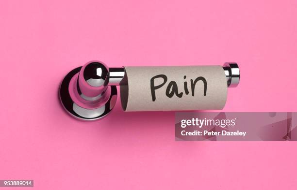 pain on toilet roll - pink medical stock pictures, royalty-free photos & images