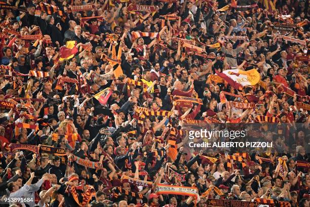 Roma's fans cheer their team before the UEFA Champions League semi-final second leg football match AS Roma vs Liverpool FC at the Stadio Olimpico in...