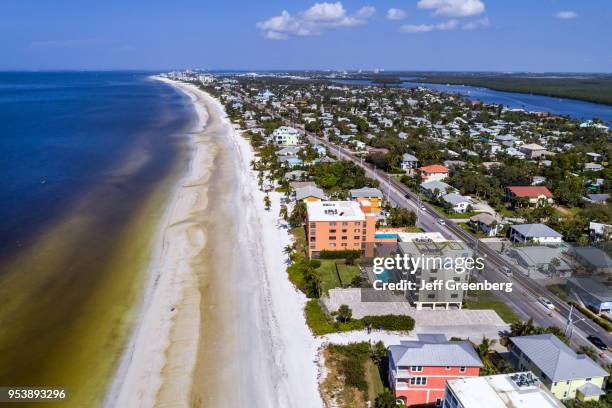 Florida, Fort Myers Beach, Estero Island, aerial view above Matanzas Pass with beach and ocean.