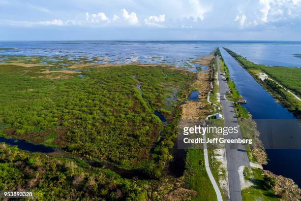 Florida, Lakeport, canal, Lake Okeechobee levee Herbert Hoover dike, aerial view.