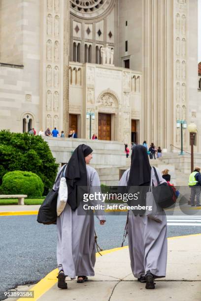 Washington DC, Basilica of the National Shrine of the Immaculate Conception, Two Nuns walking outside.