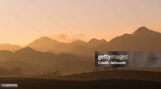 sunrise in mist in moc chau, vietnam - son la province stock pictures, royalty-free photos & images