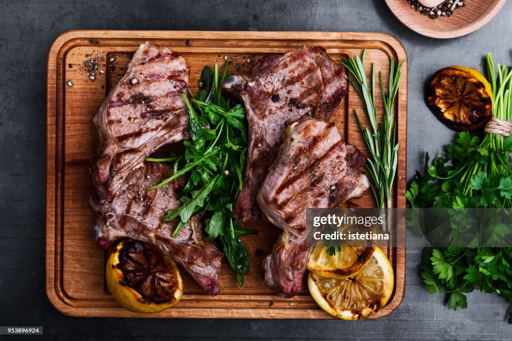 Mediterranean style grilled veal chops with fresh arugula salad