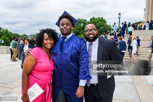 Washington DC, Basilica of the National Shrine of the Immaculate Conception, graduation ceremony, student with Parents.