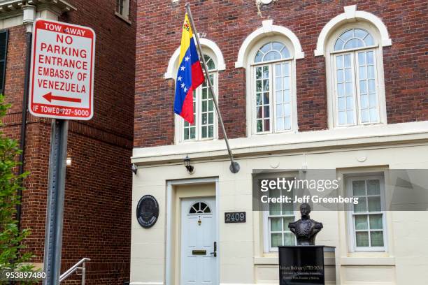 Washington DC, Kalorama Heights, Embassy of Venezuela, restricted parking sign and Simon Bolivar bust.