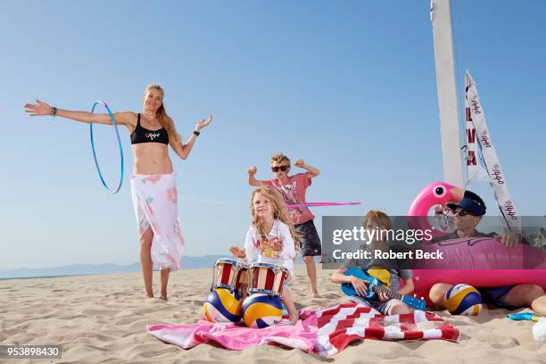 Portrait of USA Olympic gold medalist Kerri Walsh Jennings with her husband Casey Jennings and their children Joseph, Sundance, and Scout during...