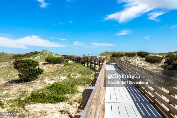 North Carolina, Cape Hatteras National Seashore, boardwalk to beach with sand dunes.