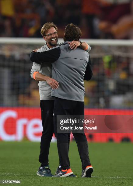 Jurgen Klopp manager of Liverpool celebrates the victory with Peter Krawietz assistant coach of Liverpool at the end of the UEFA Champions League...