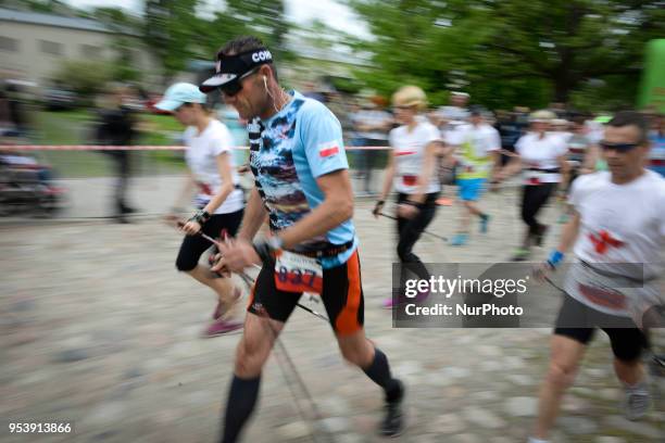 Participants are seen taking part in the Flag Day run in Warsaw, Poland on May 2, 2018. The Flag Day Run is a yearly five and ten kilometer run in...