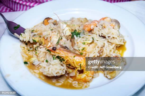 Portugal, Lisbon, Rossio, Restaurante Prazeres do Mar, seafood plate, rice and prawns.