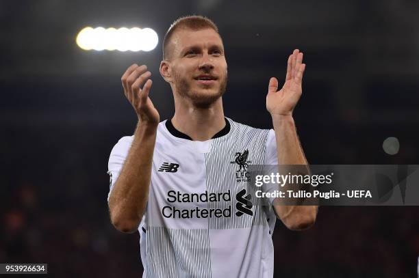 Ragnar Klavan of Liverpool greets supporters after winning the UEFA Champions League Semi Final Second Leg match between A.S. Roma and Liverpool at...