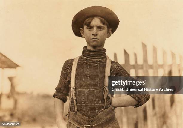 John Lewis, 12 years old, Weaver in Cotton Mill, Half-Length Portrait, Chester, South Carolina, USA, Lewis Hine for National Child Labor Committee,...