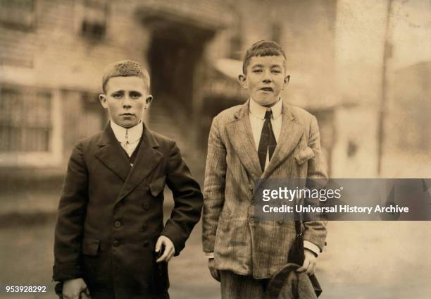 Michael Keefe, Cornelius Hurley, 13 or 14 years old, Young Mill Workers in No. 1 Mill Room, Merrimac Mill, Lowell, Massachusetts, USA, Lewis Hine for...