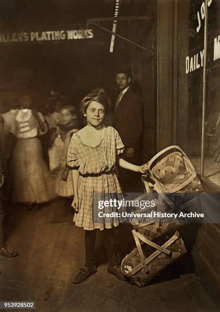 Antoinette Siminger, 12 years old, Selling Baskets at Sixth Street Market at 10:00 p.m., Full-Length Portrait, Cincinnati, Ohio, USA, Lewis Hine for...