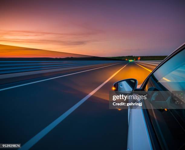 driving on the road - highway hungary stock pictures, royalty-free photos & images