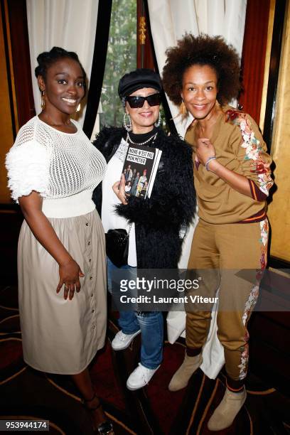 Actress Aissa Maiga, Singer Laam and Actress Sara Martins attend "Noire n'est pas mon Metier" Book Signing at Le Fouquet's on May 2, 2018 in Paris,...