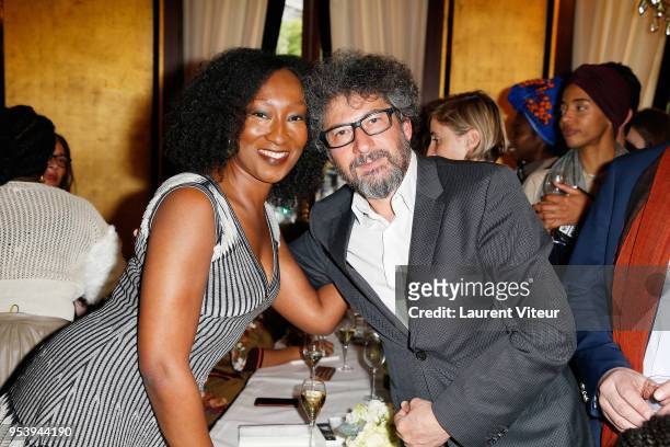 Actress Nadege Beausson-Diagne and Director Radu Mihaileanu attend "Noire n'est pas mon Metier" Book Signing at Le Fouquet's on May 2, 2018 in Paris,...