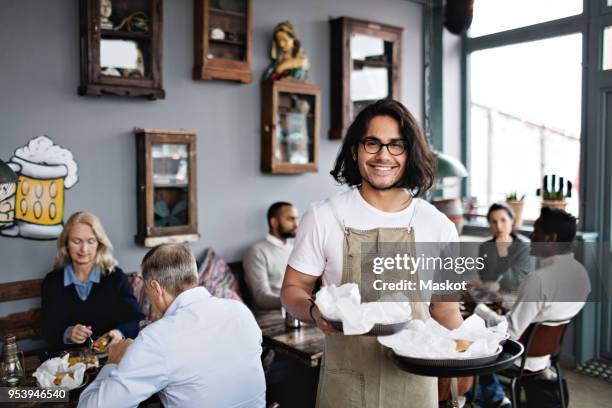 Waitering Restaurant Server Bringing Food Photos and Premium High Res Pictures ...