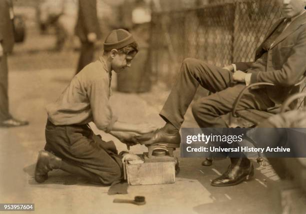 Tony, 12 years old, Shoe Shiner, Bowling Green, New York City, New York, USA, Lewis Hine for National Child Labor Committee, July 1924.