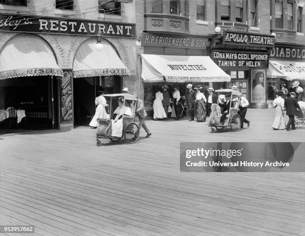 Rolling Chairs on Boardwalk, Atlantic City, New Jersey, USA, Detroit Publishing Company, 1905.