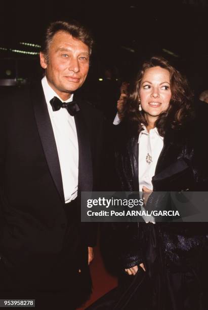 Johnny Hallyday et sa compagne Gisèle Galante lors de la cérémonie des Césars à Paris le 12 mars 1988, France.